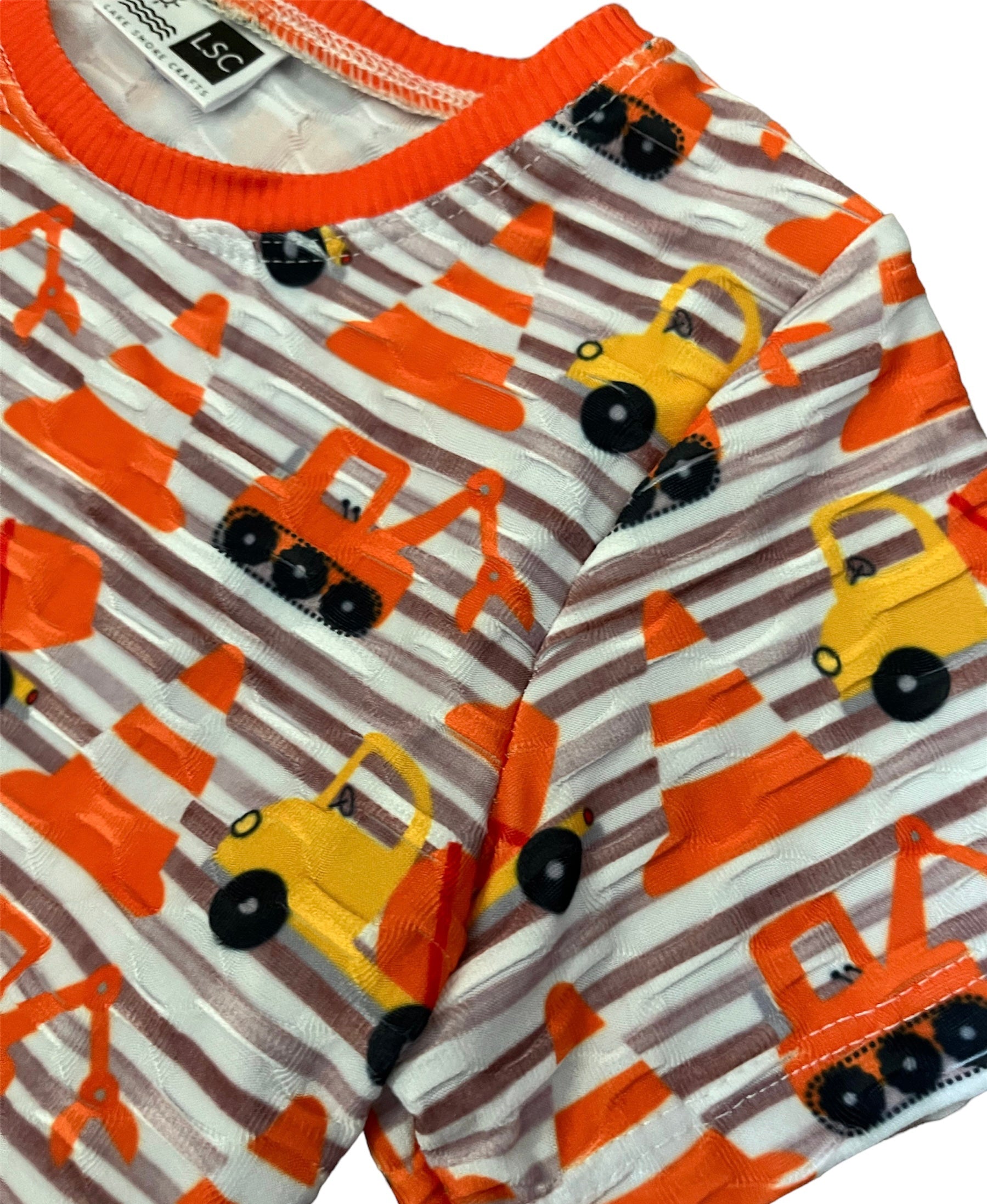 Dump trucks, cones Orange, yellow, black, white